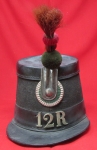 Photo: Helmets Swiss, 19th Century Shako, 12th Regiment