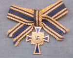 Photo: German WWII Miniature Silver Mothers Cross, L/11 Maker
